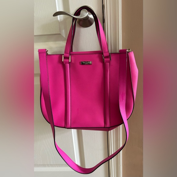 kate spade Handbags - Kate spade bright pink purse with striped interior